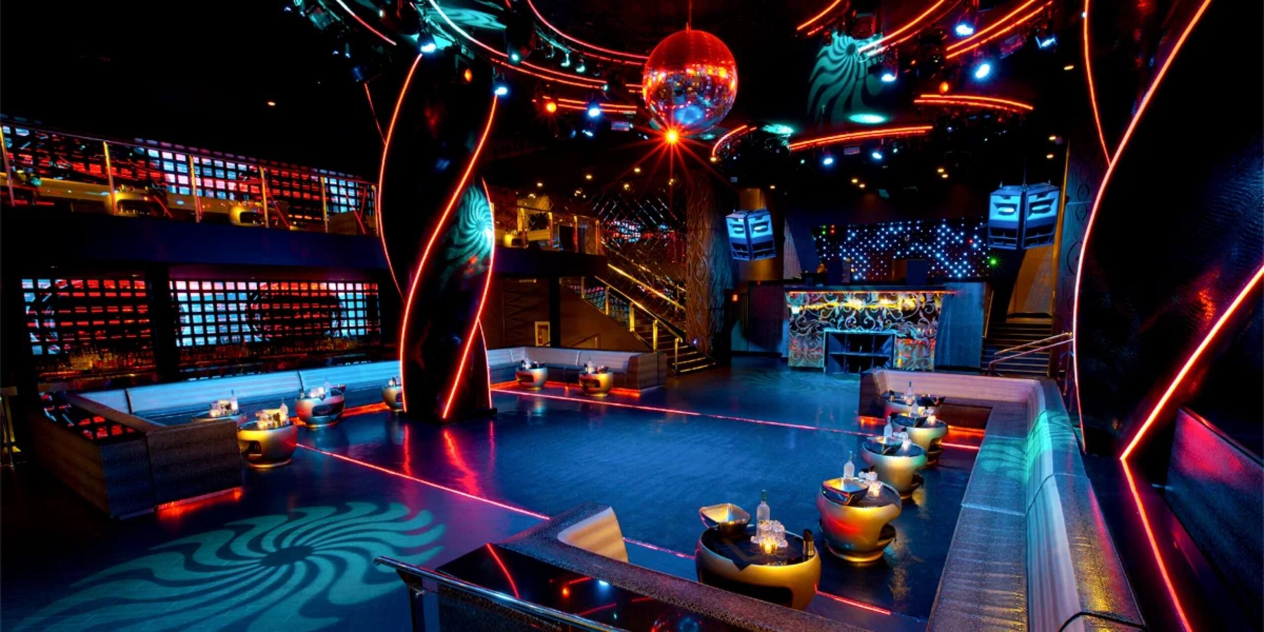 Nightclub with neon lighting and a dance floor
